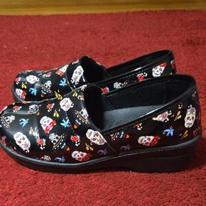 Woman Black Slip-On Shoes with Colorful Skull Design